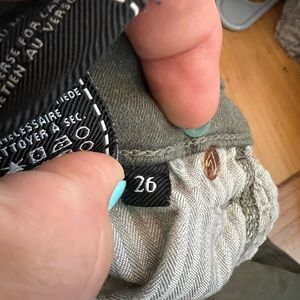 Hunter green.   Stretch.  Only worn a couple times.